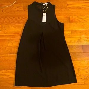 New with tags! BCBG Black dress! V neck chiffon top detail!
